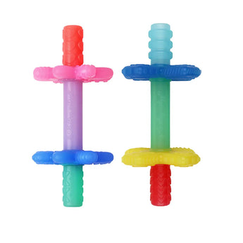 The Itzy Ritzy Teensy Tubes are a pair of BPA-free, colorful dog chew toys designed to engage pets and provide teething relief. One toy features pink, purple, and teal colors, while the other is light blue, green, and yellow. Both have textured hollow rings and cylindrical sections for added fun.