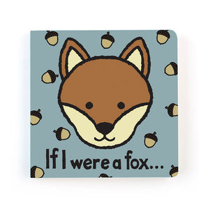 The chunky board book cover from Jellycat, If I Were a Fox, displays a cheeky fox cub’s face encircled by playful acorns on a blue background, inviting children to a whimsical woodland adventure.