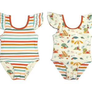 Two Emerson and Friends reversible swimsuits: one with colorful stripes, the other in a vibrant Beach Day print with crabs and umbrellas.