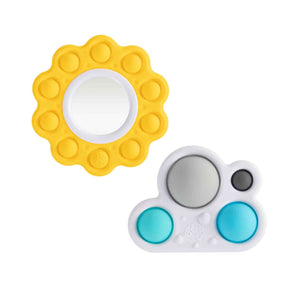 The Dimpl Billow Bright by Fat Brain Toy Co includes a yellow, flower-shaped fidget toy with silicone bubbles and a central mirror, and a cloud-shaped sensory toy with a larger mirror and blue, white, and black bubbles. Both offer engaging tactile play that enhances fine motor skills.