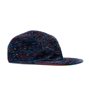 Storied Hats Adult Hat, Pride: A sustainable multicolored knitted cap with a flat brim in blue, red, and yellow threads.