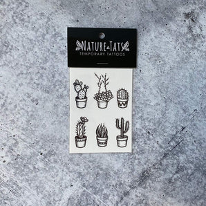 NatureTats Temporary Tattoo Potted Cactus features potted cacti and succulents on gray—a must-have for desert lovers!.