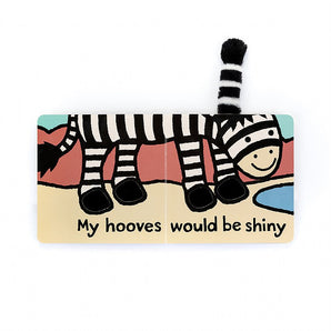 Illustration from Jellycats If I Were a Zebra Book shows a cheerful zebra with a fuzzy tail. Text: My hooves would be shiny.