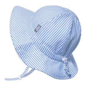 The Jan and Jul Sun Hat in Blue Stripes provides sun protection with a wide brim and adjustable chinstrap. It features a Gro-With-Me design, a side label, and a back toggle for flexible sizing.