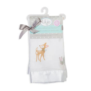 A white muslin blanket with a deer and rabbit, branded Lulujo Inc., and tagged as Security Blanket, Little Fawn, with gray ribbon.