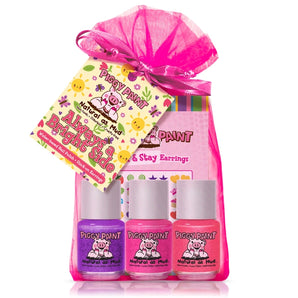 A pink bag with three bottles of colorful Piggy Paint, Gift Set Always A Bright Side polish and a tag with playful designs.