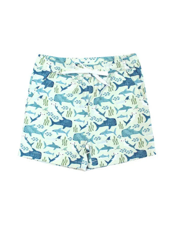 Emerson and Friends Shark Friends swim trunks feature a vibrant blue and teal shark and seaweed pattern on light green fabric, perfect for summer adventures. They include an adjustable white drawstring at the waist for a secure fit.