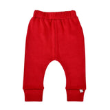 Scarlet Organic Cotton Pants by Finn and Emma offer a simple, classic style with an elastic waistband and folded cuffs. Made from eco-friendly dyes on soft, cozy organic cotton, theyre designed for infant comfort.