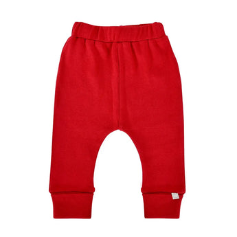 Scarlet Organic Cotton Pants by Finn and Emma offer a simple, classic style with an elastic waistband and folded cuffs. Made from eco-friendly dyes on soft, cozy organic cotton, theyre designed for infant comfort.