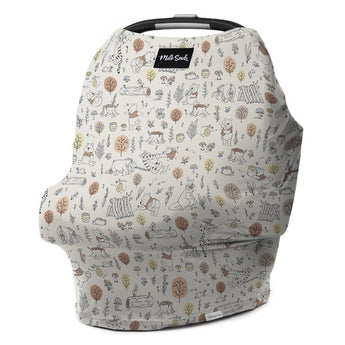 Discover the Milk Snob Cover Disneys Winnie the Pooh Baby Bee, a multifunctional cover featuring bears, foxes, trees, and autumn leaves on a light background. Ideal as a baby car seat or nursing cover, it blends practicality with charm.