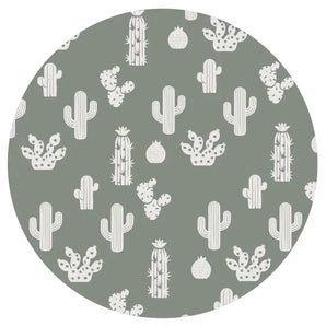 Cacti with various shapes on a muted green circle, featured in PJs with pants by Emerson and Friends. Stay Sharp!.