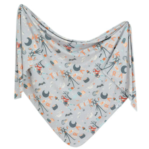 Copper Pearl Knit Swaddle Blanket, Nightmare Before Christmas: This gray blanket features Halloween prints, ideal for modern triangular designs.