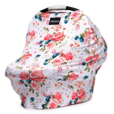 The Milk Snob Cover French Floral is a multifunctional baby car seat accessory featuring a floral pattern with pink, blue, and green flowers on a crisp white background.