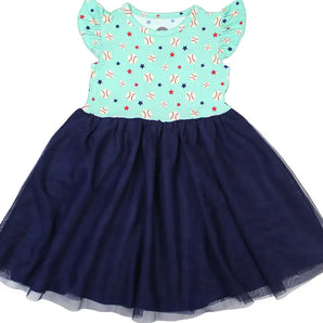 A childs Baseball Buddies twirl dress by Emerson and Friends with a blue star and bow top and navy tulle skirt.