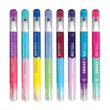 Eight vibrant Double-Ended Layering Markers by OOLY are arranged vertically, each with a clear cap. Ideal for young artists, they include colors like pink, orange, yellow, and shades of blue and purple for creative layering techniques using their bright hues.