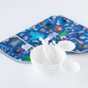 Liven up mealtime with Bumkins Silicone First Feeding Set: Mickey Mouse Vanilla Sprinkle featuring vibrant cartoon characters.