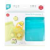 The packaging of Bumkins Silicone Flat Reusable Bag 2 Pack, Blue features two bags, food slices, and a child-friendly zip seal label.