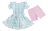 Birdie Beans Pastel Gingham Birdie Dress has ruffled sleeves and lace hem, paired with fun light pink shorts.