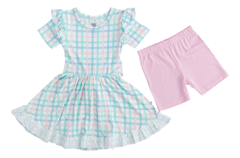 Birdie Beans Pastel Gingham Birdie Dress has ruffled sleeves and lace hem, paired with fun light pink shorts.