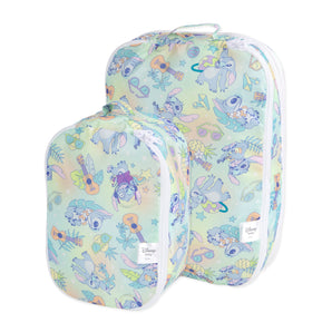 Two Bumkins Aloha Stitch luggage bags with guitars, sunglasses, and pineapples in a tropical print.