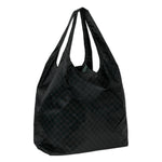 The Packable Tote Bag: Rich Black by Bumkins is reusable with a checkered pattern, ideal for stylish shopping.