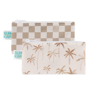 Two stylish Bumkins snack bags: palm and checkered designs, perfect as travel organizers.