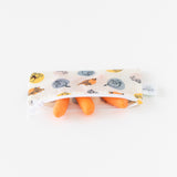 Three carrots in a Bumkins Reusable Snack Bag, Small 2 Pack: Pooh Bear and Friends, set against a white background.