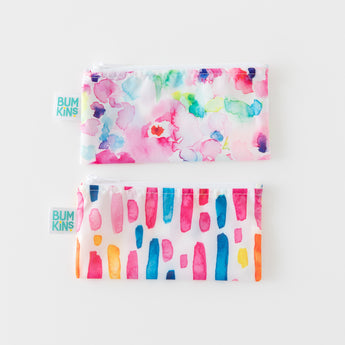 Two waterproof pouches with abstract designs from Bumkins; perfect reusable snack bags.