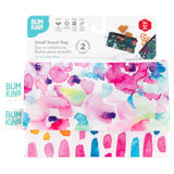 Two vibrant Bumkins reusable snack bags, Watercolor & Brush Strokes, with waterproof fabric. Machine washable and eco-friendly.