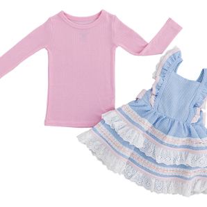 The Birdie Bean Seersucker Linen Birdie Twirl Set features a pink bamboo pointelle top paired with a blue and white striped dress with ruffled shoulders, a layered lace hem, and delicate pink stripes.