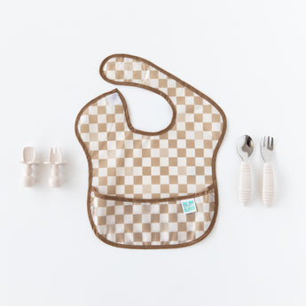 Bumkins Silicone Chewtensils®: Sand—checkered baby bib with brown trim, includes a sensory spoon & fork for baby-led weaning.