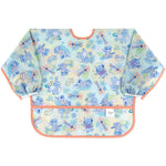 Bumkins Sleeved Bib: Aloha Stitch—pastel Disney design with Stitch cartoons, instruments, and plants; orange trim & waterproof with long sleeves.