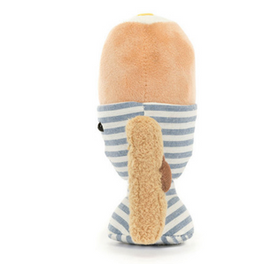 Introducing the Jellycat, Amuse Eggetha Egg & Lance Soldier by Jellycat, an adorable plush toy dressed in a chic blue and white striped sleeve, with a cute tan handle at the back resembling an adorable ponytail.