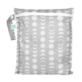 The Wet Bag: Lunar Phase by Bumkins is gray with a white moon phase pattern and zipper. Made from waterproof fabric with heat-sealed seams, it includes a snap handle and features a teal Bumkins label.