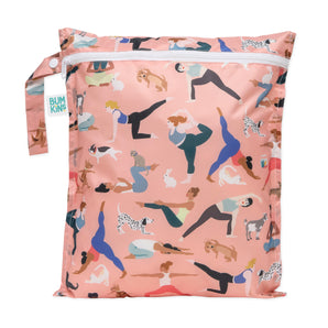 Bumkins Wet Bag: Yoga Pals—features people and dogs doing yoga, with heat-sealed seams, a zipper, and the Bumkins logo.