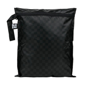 A black Bumkins Wet Bag, Rich Black, with a checkered pattern is waterproof and has a label on the side strap.