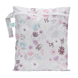 Bumkins Wet Bag: Floral with pastel pink, purple, and blue flowers on waterproof fabric.