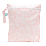 The Wet Bag: Lace by Bumkins features a pale pink floral design, waterproof fabric, zipper closure, and a handle with the brand label.