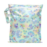 Bumkins Wet Bag: Aloha Stitch features pastel tropical patterns with Stitch illustrations, ukuleles, pineapples, and tropical leaves.