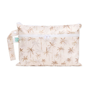 Bumkins Palm Daze Wet/Dry Clutch: Beige with palm tree print, zipper closure, waterproof fabric, and side handle loop.