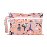 The Bumkins Wet/Dry Clutch: Yoga Pals features diverse people and animals practicing yoga on a peach background. Crafted from waterproof fabric, it includes a zip closure and a snap handle, making it the perfect vibrant reusable accessory for your active lifestyle.