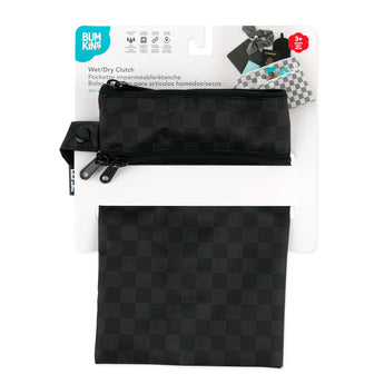 Bumkins Wet/Dry Clutch: Rich Black shown folded in its packaging.