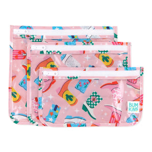 Bumkins: Clear Travel Bag 3 Pack: Boots includes three TSA-compliant pouches made of pink waterproof fabric with a cowboy boot pattern.