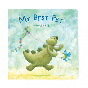 The Jellycat My Best Pet Book cover, by Louise Tate, features a whimsical illustration of a Jurassic dinosaur flying a kite with a bird, evoking the charm of a Stegosaurus against blue and green watercolor textures.