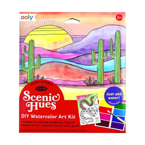 Desert Getaway DIY Watercolor Kit by OOLY: Includes paints, brush, outlined art & postcards. Ages 8+. Box art: desert landscape, cacti, sunset.