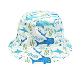 The Shark Friends reversible bucket hat by Emerson and Friends features blue smiling cartoon sharks and seaweed patterns.