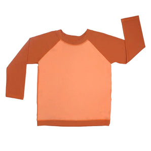 Emerson and Friends Long Sleeve Rashguard in Coral/Peach: light orange body and vibrant orange sleeves on a white backdrop.