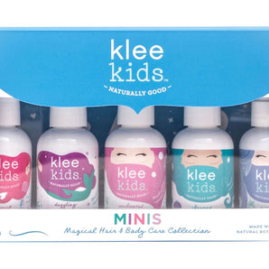 Set of 5 travel-size Klee Kids Magical Hair & Body Collection bottles in a blue/white floral box, made in USA by Klee Naturals.