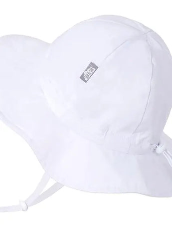 White sun hat by Jan and Jul: wide brim for sun protection, adjustable chinstrap, Gro-With-Me label on side.