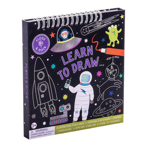 Learn to Draw, Space by Floss and Rock features astronauts, rockets & UFOs on reusable starry backgrounds.